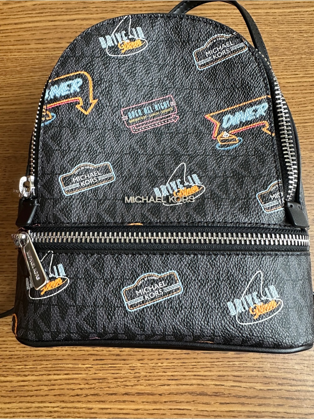 Michael Kors Black Mini Backpack with Multicolor Logo Accents
